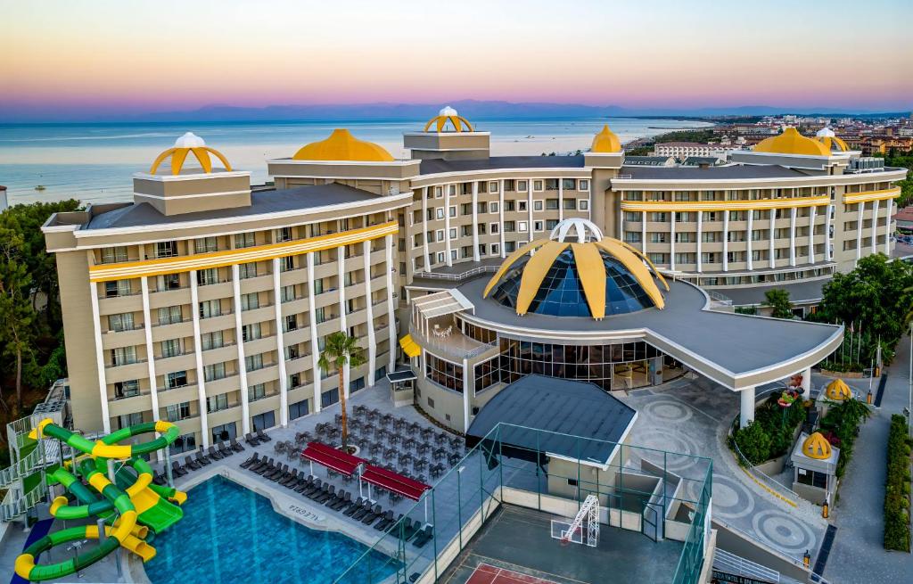 an aerial view of a hotel with a water slide at Side Alegria Hotel & Spa - All Inclusive-Adult Only in Side