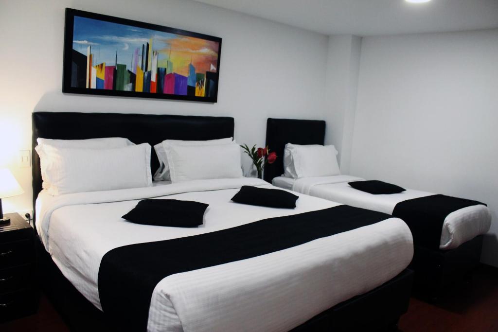 Postel nebo postele na pokoji v ubytování Hotel Radel Superior
