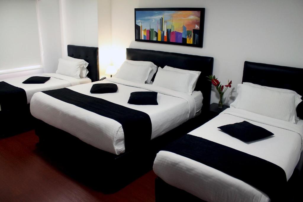 Postel nebo postele na pokoji v ubytování Hotel Radel Superior
