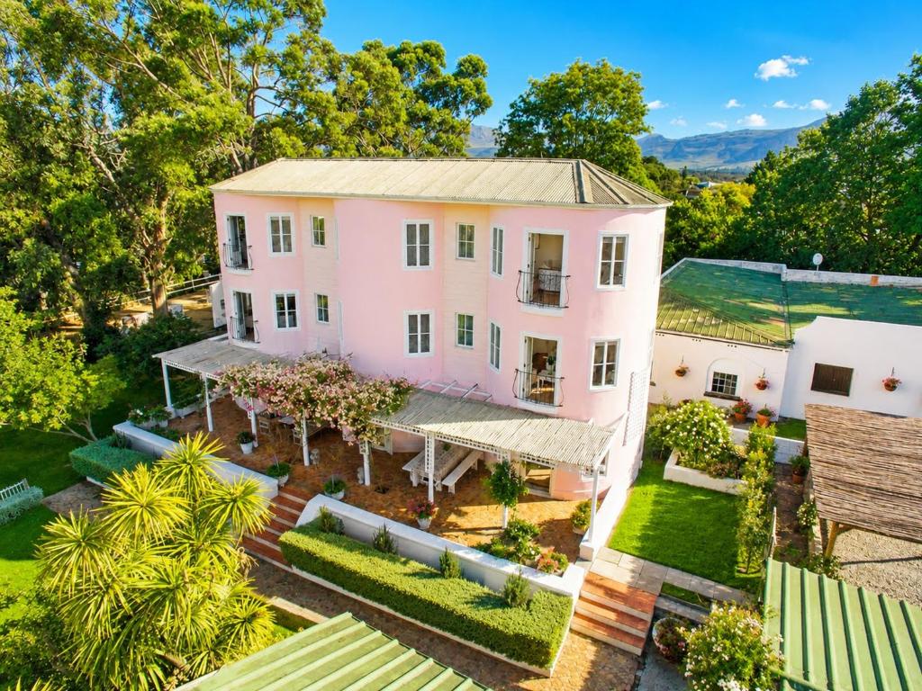 an aerial view of a pink house at Constantia The Silos in Sweet Valley