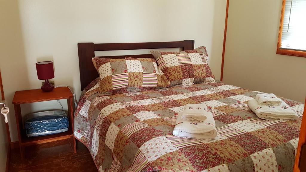 Posteľ alebo postele v izbe v ubytovaní Cabaña Racu