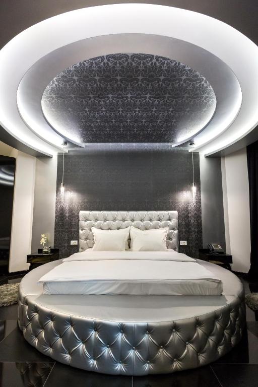 Voodi või voodid majutusasutuse Hotel Crystal Light toas