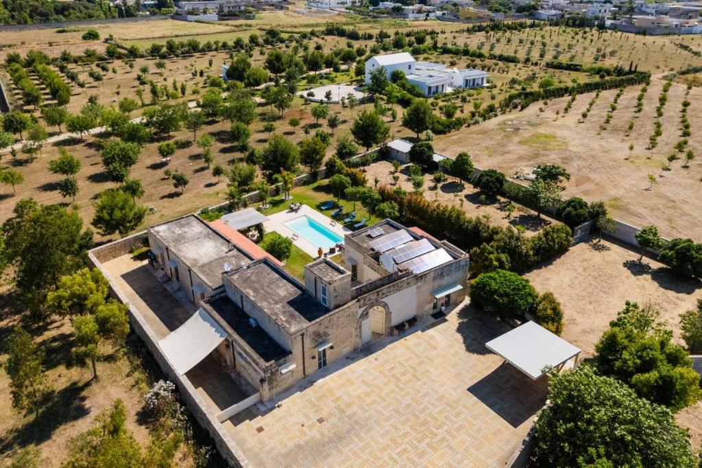 an aerial view of a large house with a swimming pool at Villa Queen by Perle di Puglia in Lecce