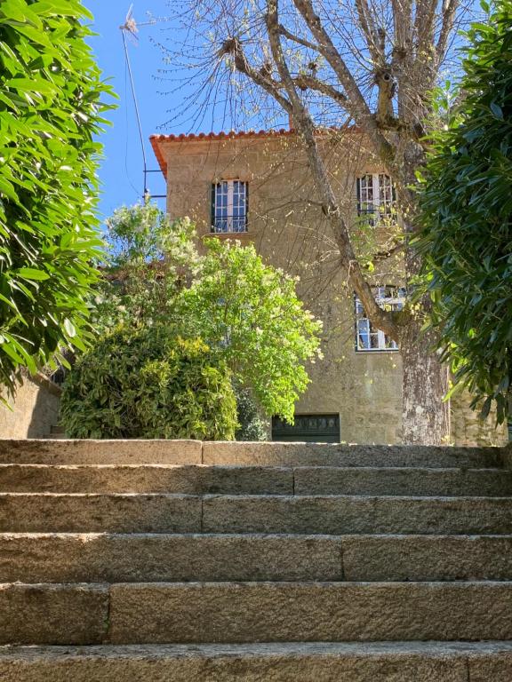 a set of stairs in front of a building at Manor House Dungeon in Chozendo