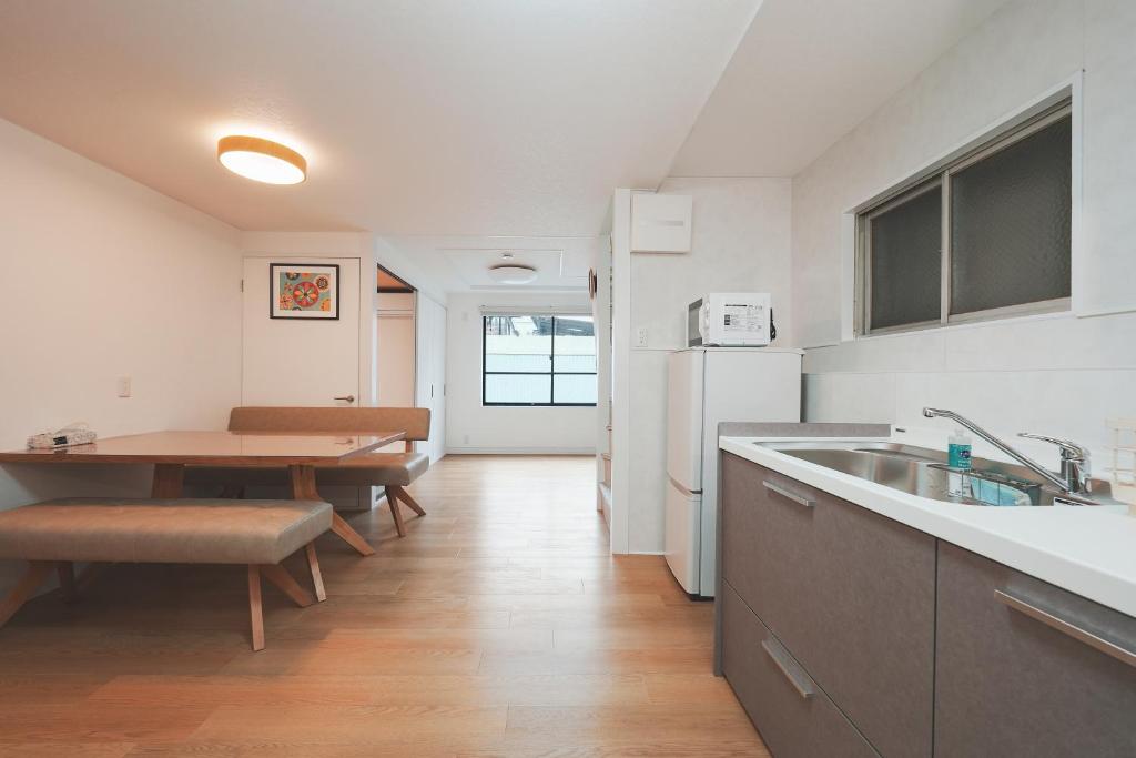 Newly Opened Nishiya Near Namba Nipponbashi and Tsutenkaku 3 Min Walk to Ebisucho Station Spacious Family Apartments 2 Bedroom for Up to 6 Guests and 3 Bedroom for Up to 7 Guests