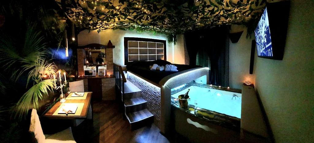 a living room with a bath tub in a room at La Suite Pisa in Pisa