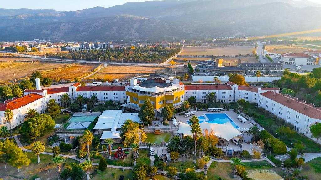 an aerial view of a city with a building at Richmond Pamukkale Thermal in Pamukkale