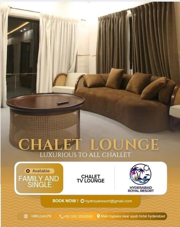 a poster of a living room with a couch and a table at Hyderabad Royal Resort in Tālib Sumro