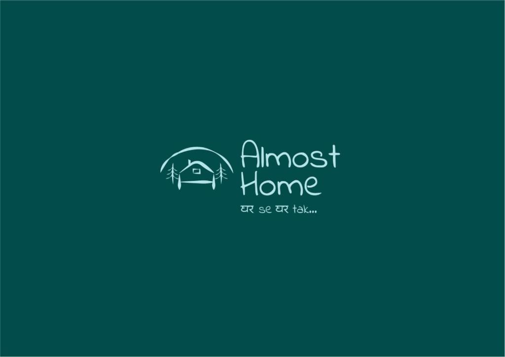 a logo for a guest house at Almost Home in Shangarh