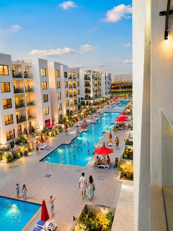 an overhead view of a swimming pool in a resort at Studio in Porto Said Compound in Port Said