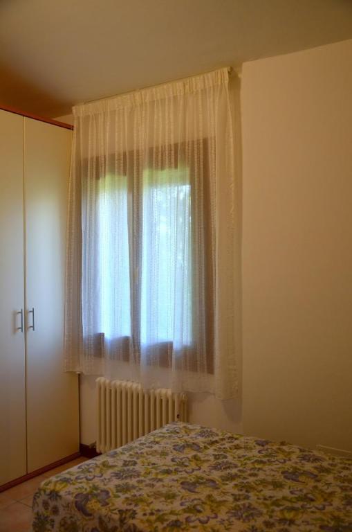 Posteľ alebo postele v izbe v ubytovaní Agriturismo Alla Corte