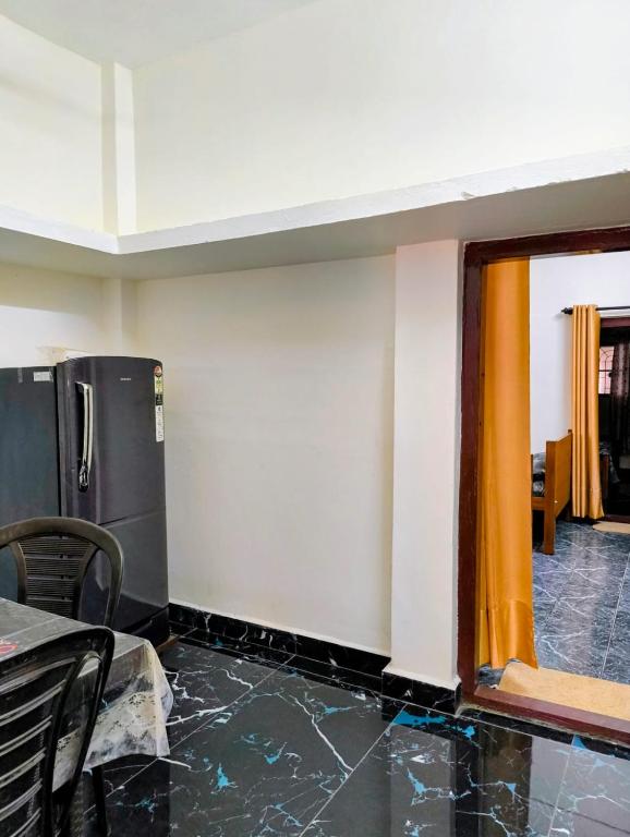 a room with a wall that has been damaged at KHS Ranganath-G in Tiruchirappalli
