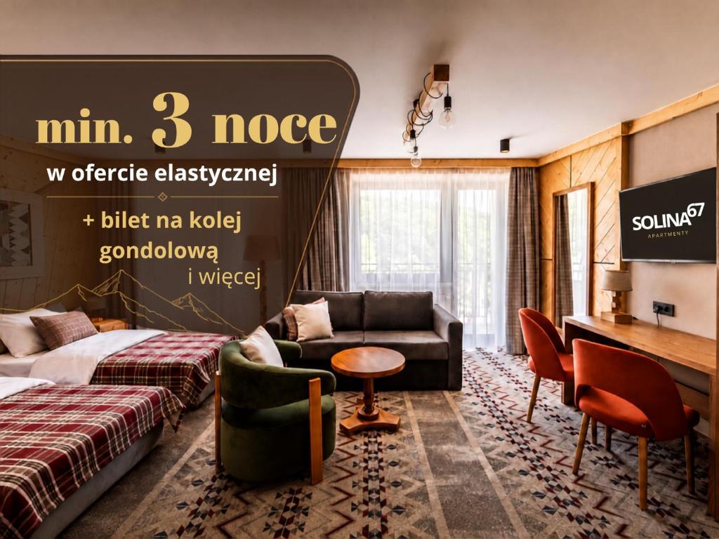 a hotel room with a bed and a couch at Apartamenty Solina 67 in Solina