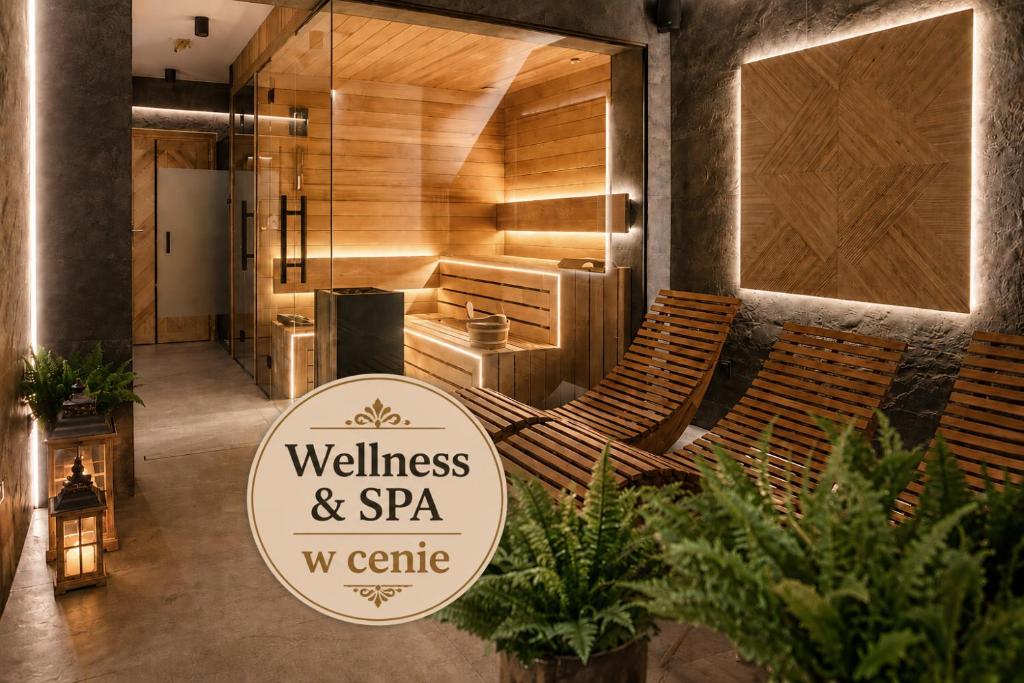 a wellness and spa w centre sign in a room with chairs at Pensjonat Litworówka Wellness&SPA in Poronin