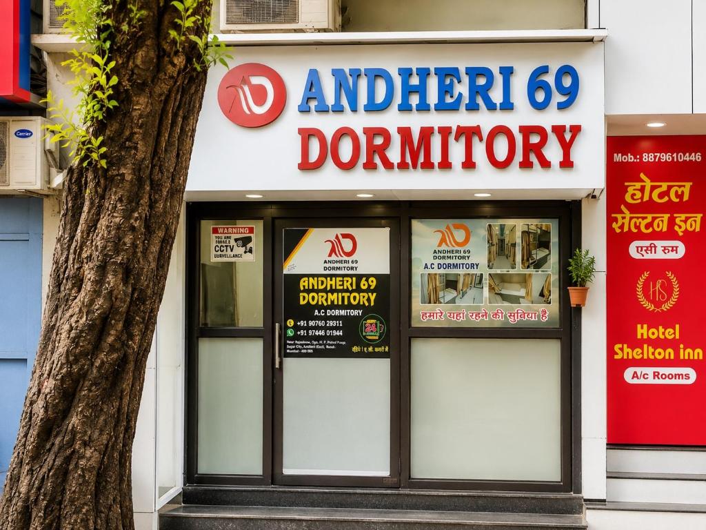 a sign for an ant kitchen donut shop at Andheri-69-Dormitory in Mumbai