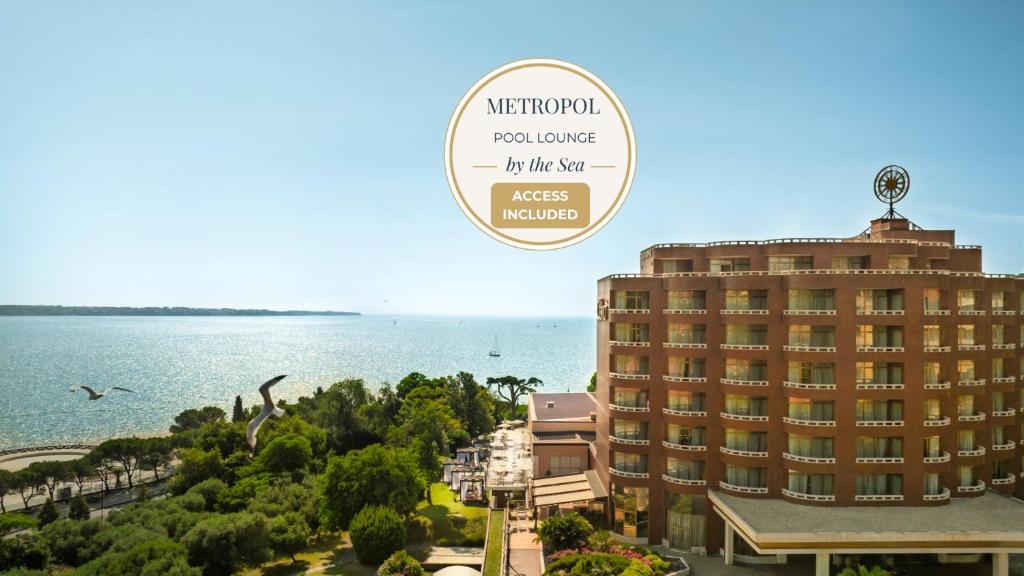 a rendering of a hotel with the ocean in the background at Remisens Hotel METROPOL in Portorož