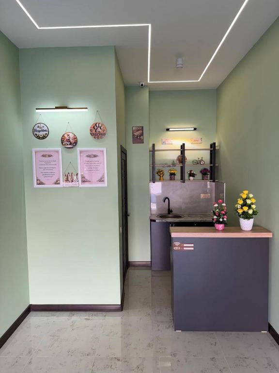 a room with a counter and aasteryasteryasteryasteryasteryasteryasteryasteryastery at Eco Otel in Quba