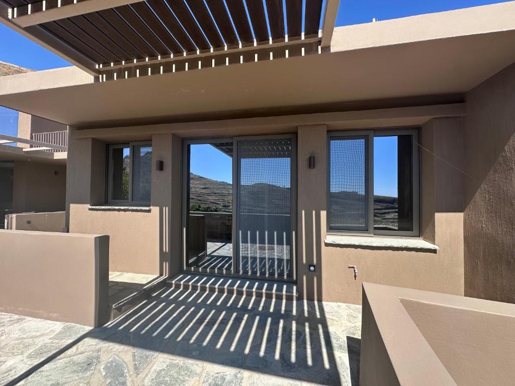 a house with a glass door with a view at Karya View 2 in Kariá