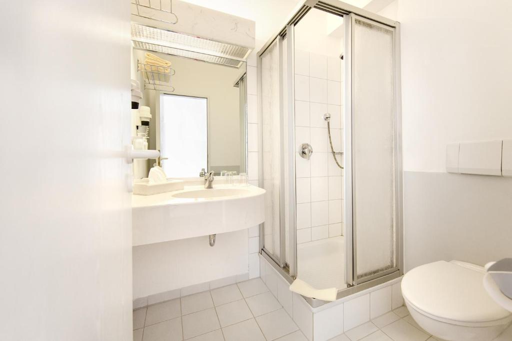 Koupelna v ubytování Hotel Montana