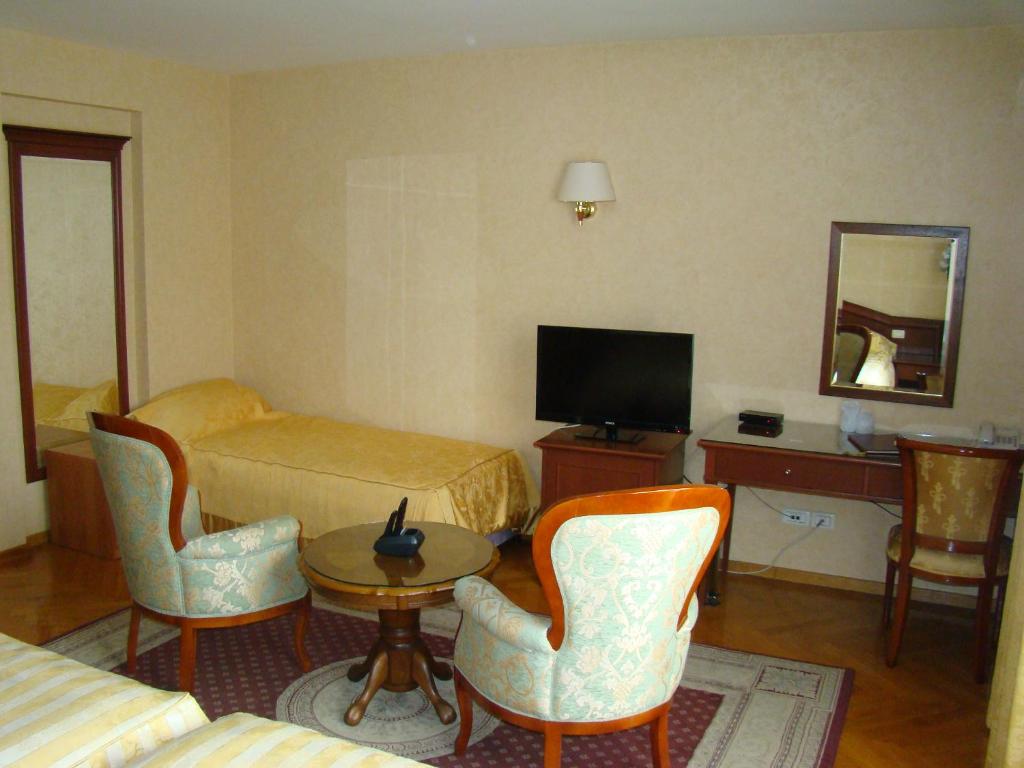 TV a/nebo společenská místnost v ubytování Hotel Vila Ariston