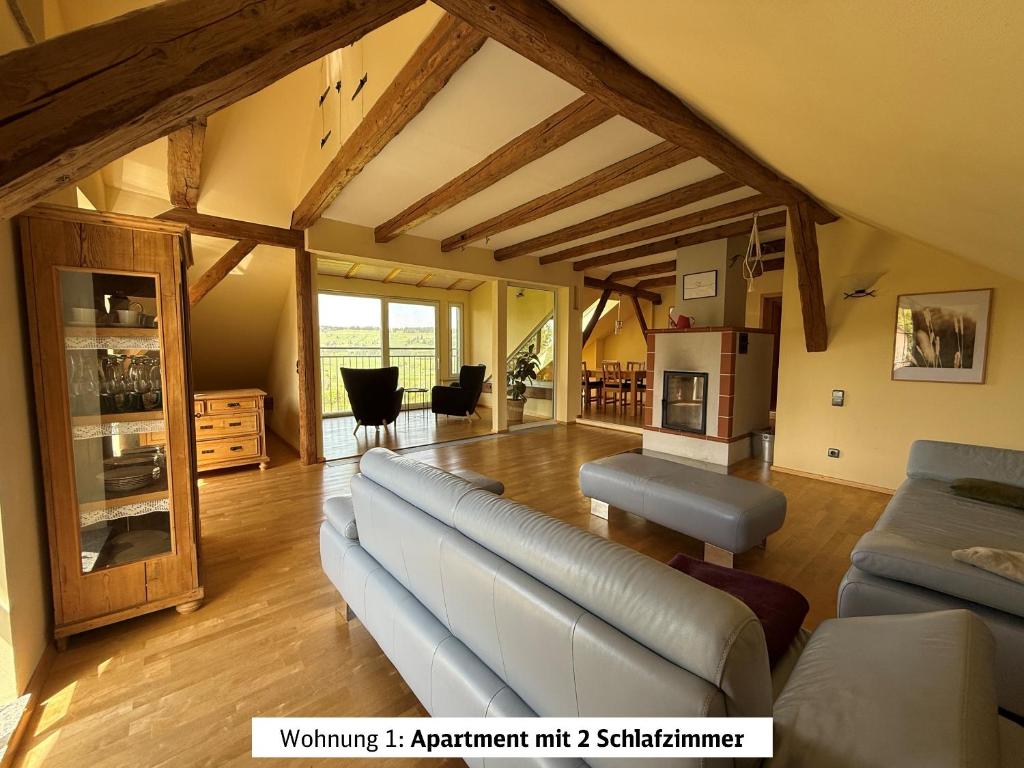 a living room with a couch and a table at Schads Bergheimat in Wertach