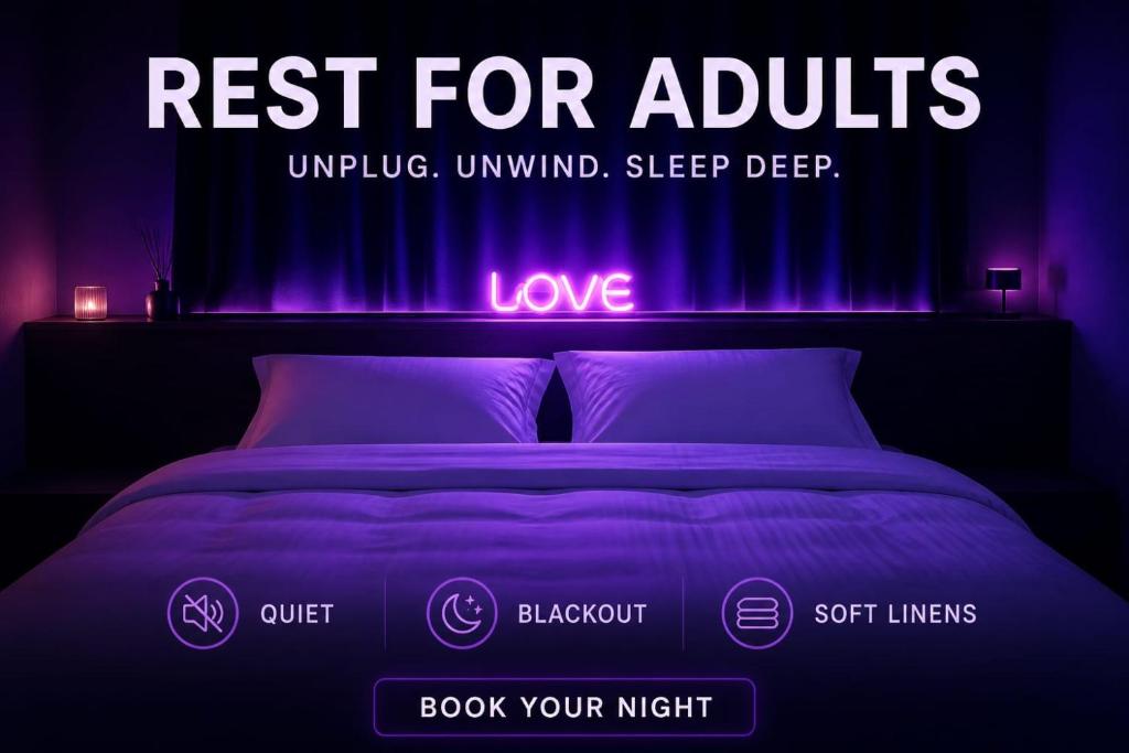 a bedroom with a bed with purple lighting at Jacuzi Cottage in the olive grove in Pula