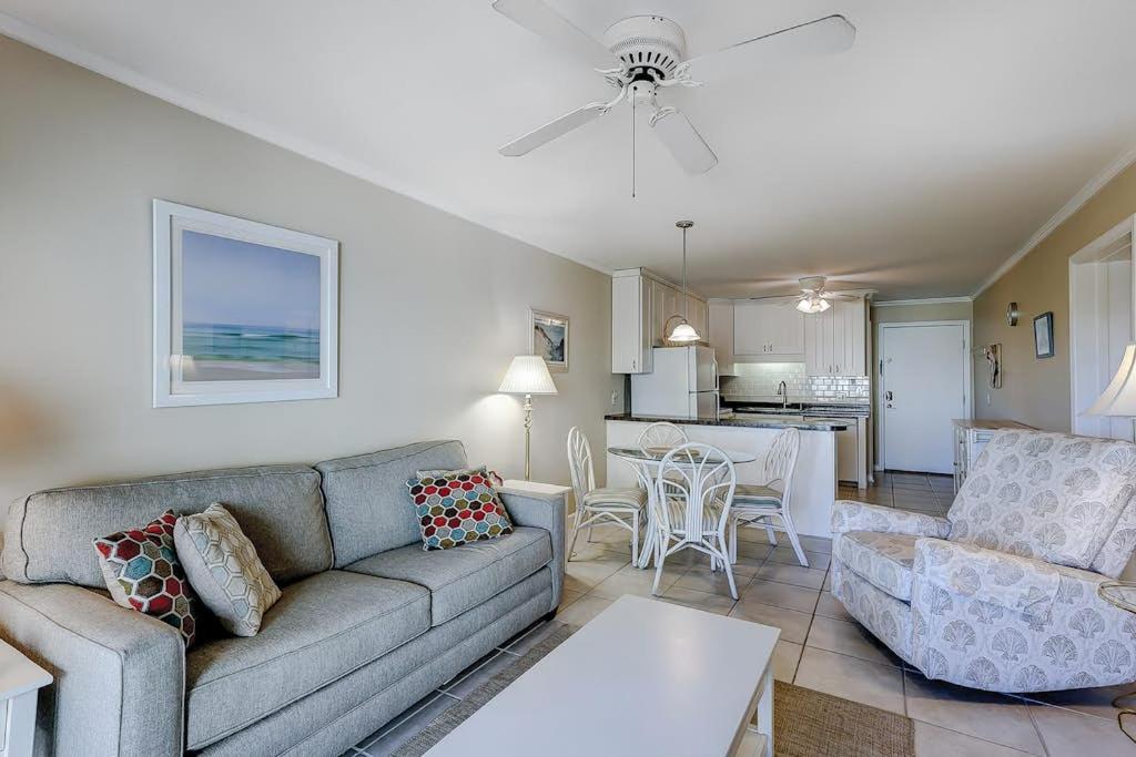 a living room with a couch and a table at Beachwood Place 3E in Hilton Head Island