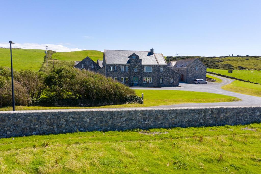 an old house on the side of a road at Apartment 1 in Doolin