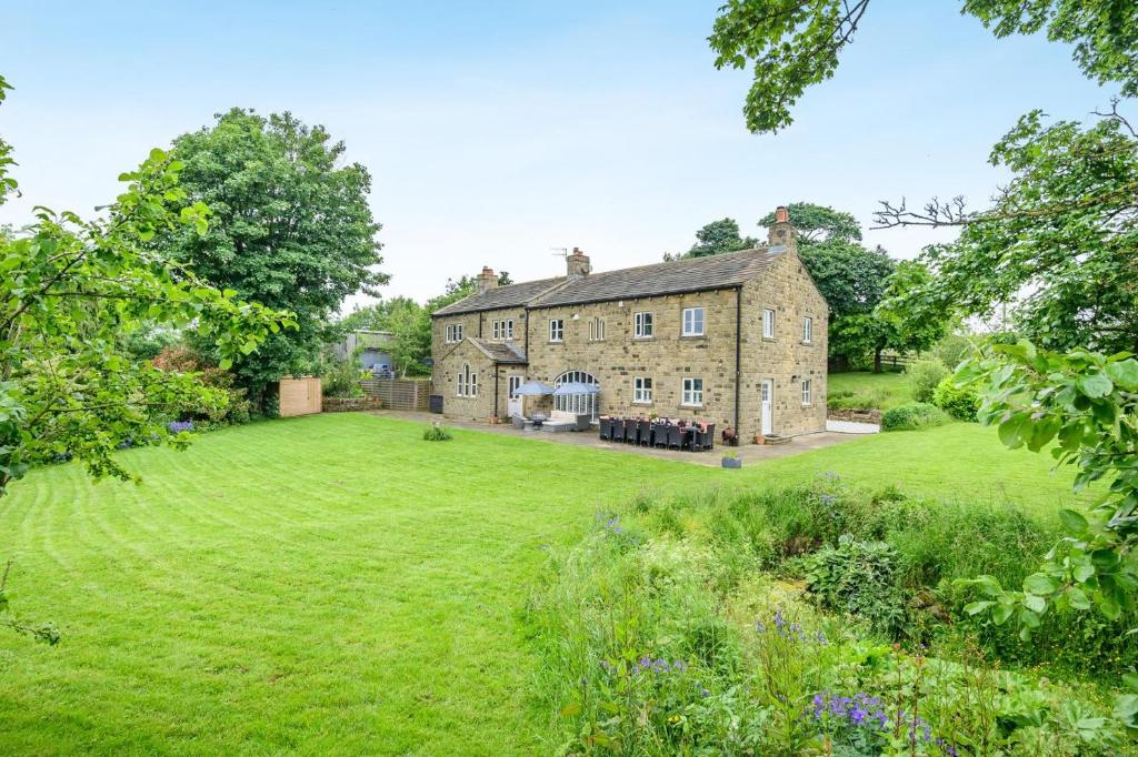 an old stone house with a large yard at 7 Bed in Langbar oc-d34075 in Middleton