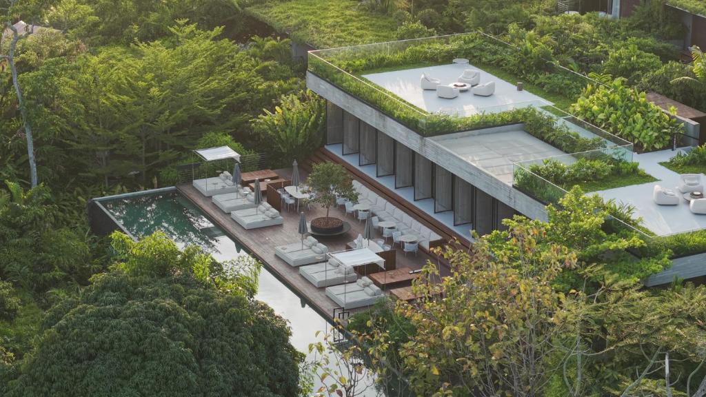 an aerial view of a house with a garden at Fuso Concept Hotel in Florianópolis