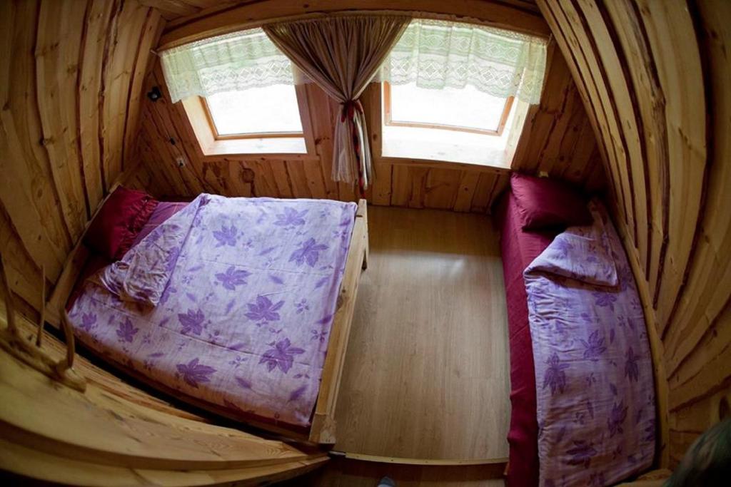Postel nebo postele na pokoji v ubytování Järve Cottages
