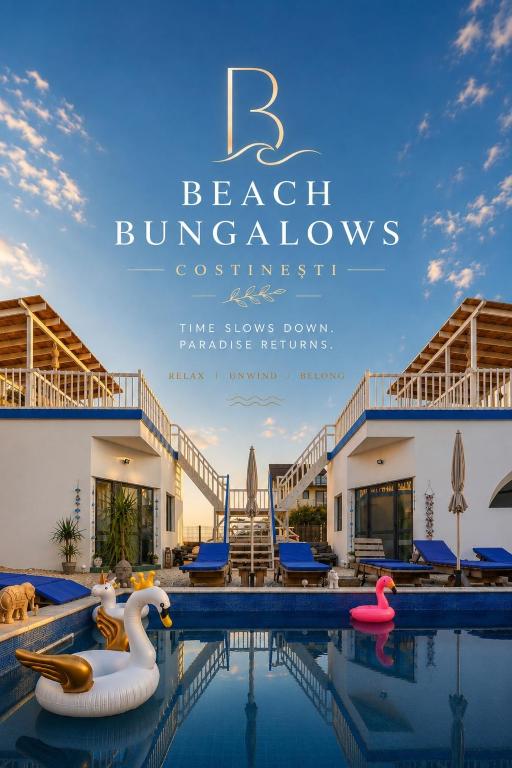 a resort with a swimming pool with swans in it at Beach Bungalows Costinesti in Costinesti