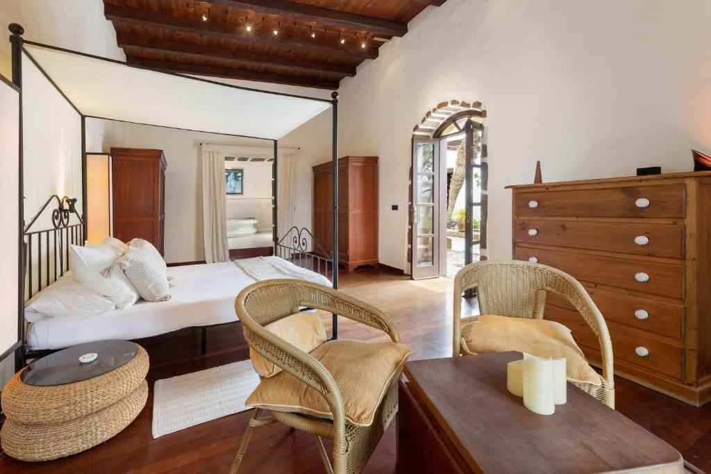 Cama o camas de una habitación en Villa Muller by Bayside - The Fountain of Silence