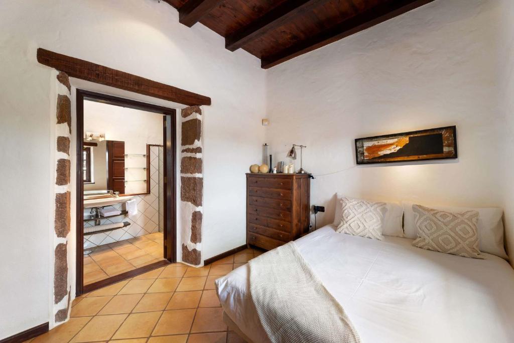 Cama o camas de una habitación en Villa Muller by Bayside - The Fountain of Silence