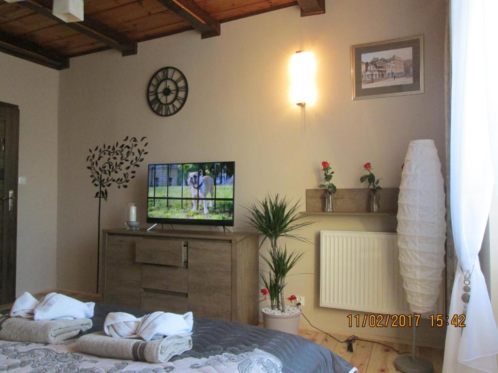 Posteľ alebo postele v izbe v ubytovaní Apartamenty Przy Farze