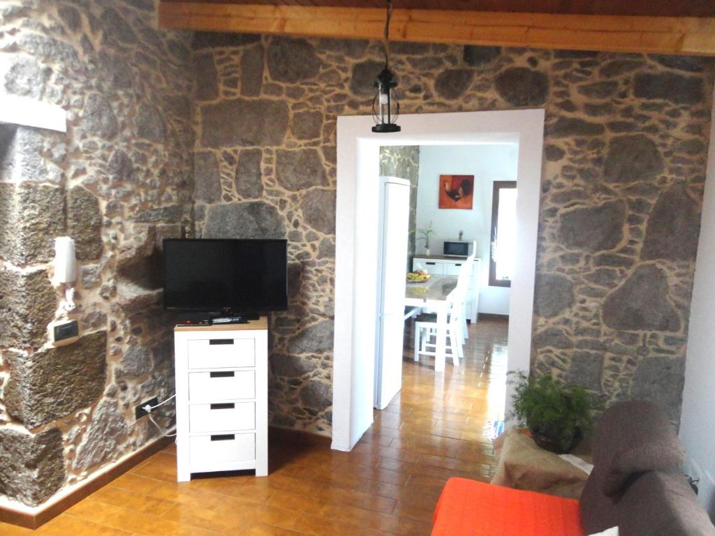 TV a/nebo společenská místnost v ubytování Villa Canaria piscina jacuzzi jardín