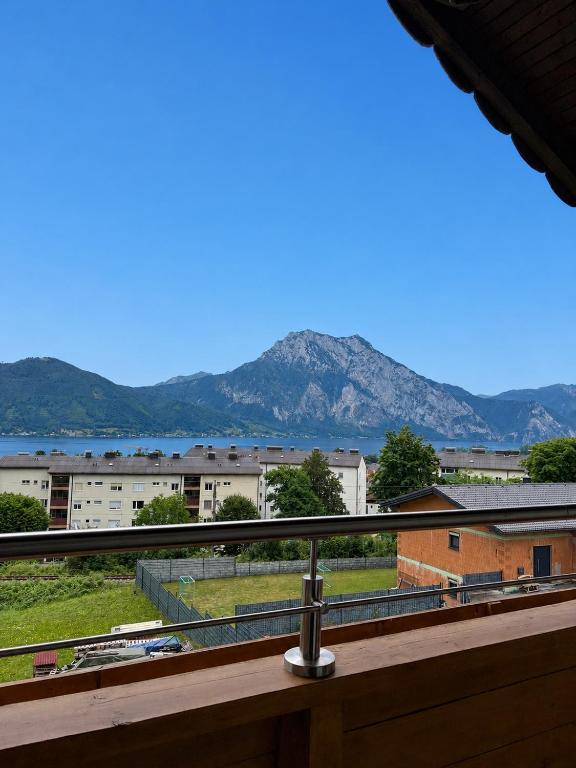 a view of the mountains from a balcony at Ferienwohnung Bergpanorama Waldweg in Altmünster