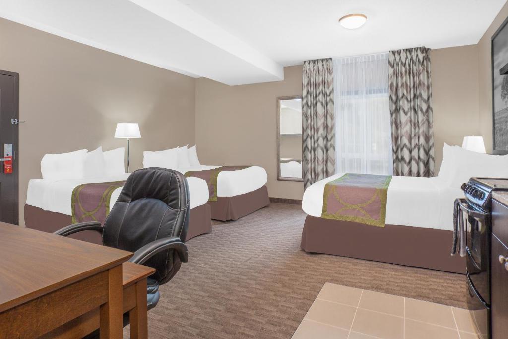 Postel nebo postele na pokoji v ubytování Super 8 by Wyndham Athabasca AB