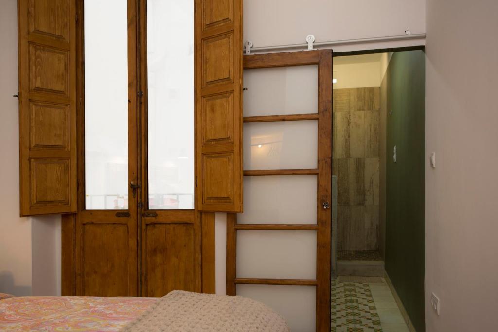 Postel nebo postele na pokoji v ubytování Eco-Friendly Apartments