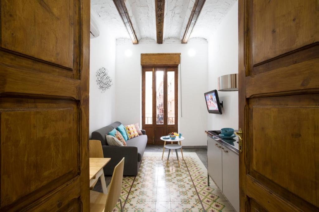 TV a/nebo společenská místnost v ubytování Eco-Friendly Apartments