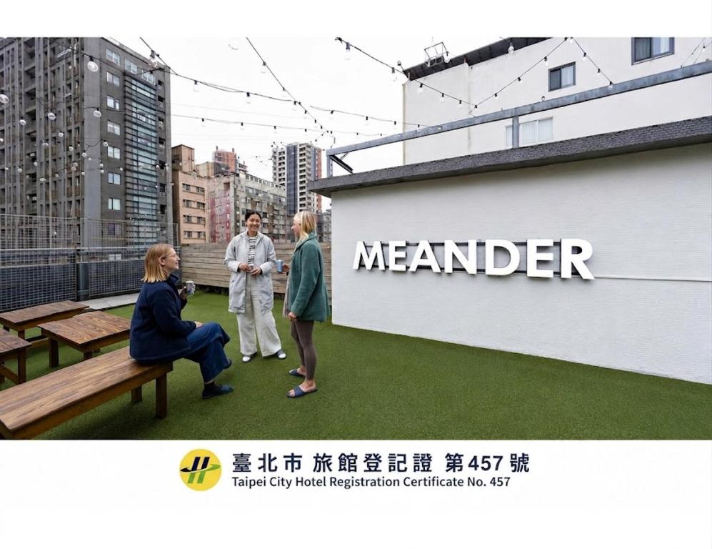 a group of people standing on top of a building at MEANDER Taipei in Taipei