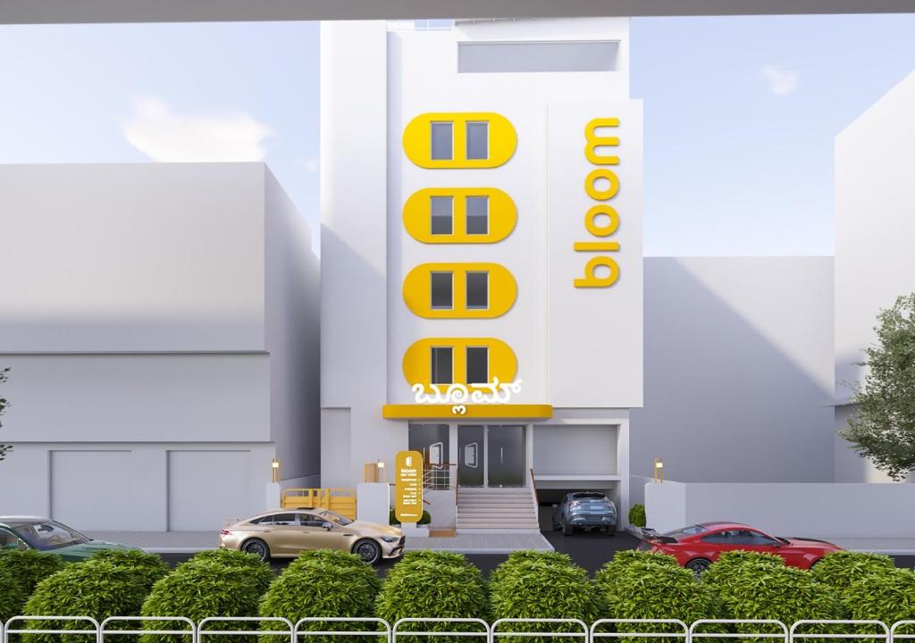 a rendering of a hotel sign in front of a parking lot at Bloom Hotel CMH Road Indiranagar in Bangalore