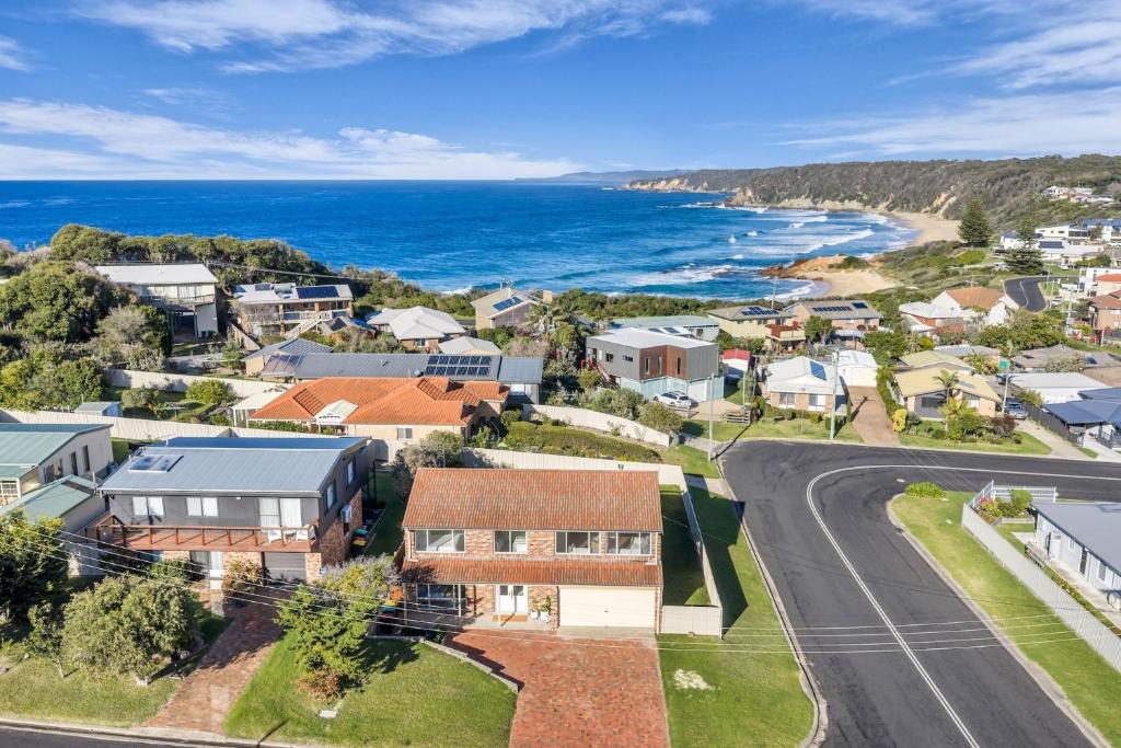 an aerial view of a town with the ocean at Callow Place 10 in Bermagui