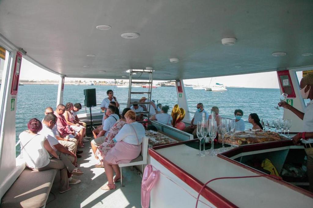 a group of people on a boat in the water at Lady Victoria in Walvis Bay