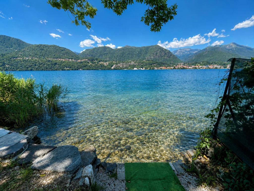a view of a lake with mountains in the background at Residence Belvedere by Lago Reisen in Omegna