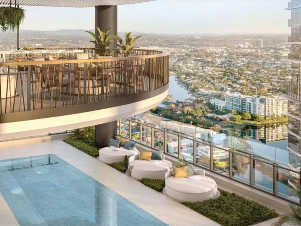 a view from the top of a building with a swimming pool at OMI Collection Broadbeach in Gold Coast
