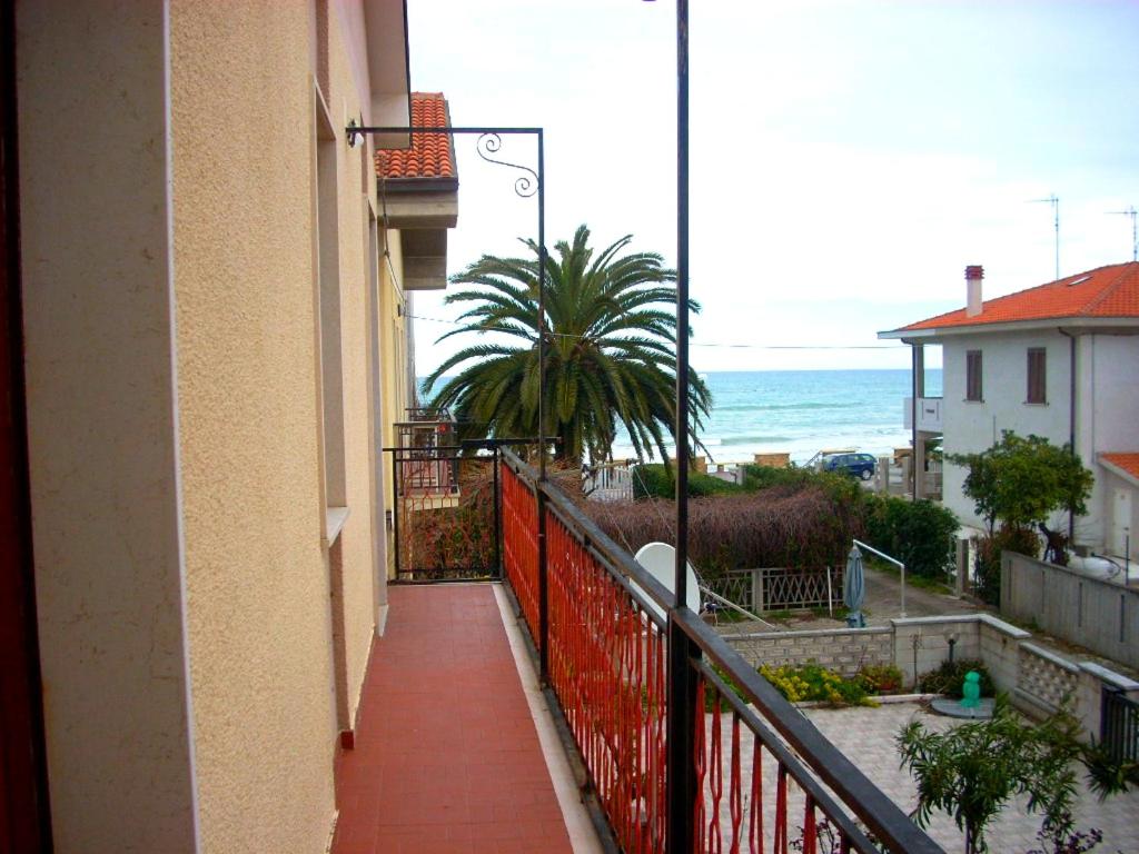 a balcony of a building with a view of the ocean at Charming house with sea view in Contrada Termini in Casalbordino