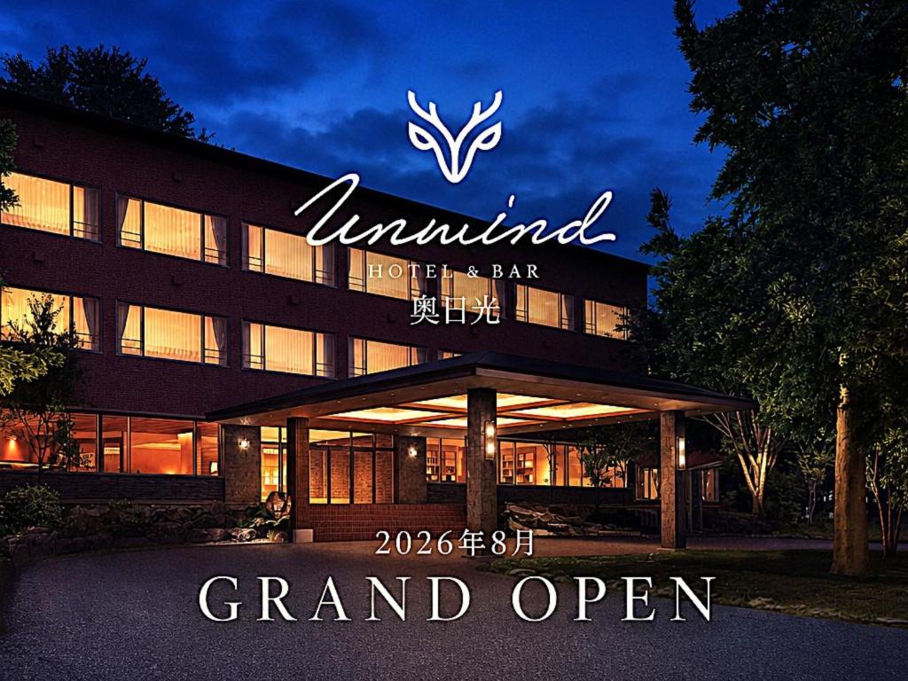 a building with a sign that reads grand open at UNWIND HOTEL & BAR Okunikko in Nikko