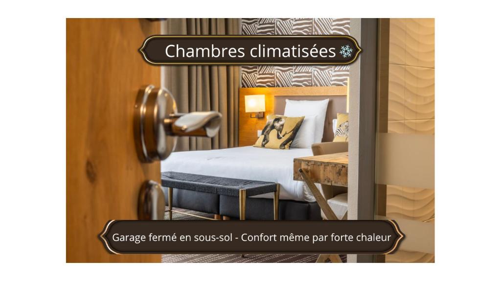 a picture of a hotel room with a bed and a door at Brit Hotel Strasbourg Le Lodge in Strasbourg