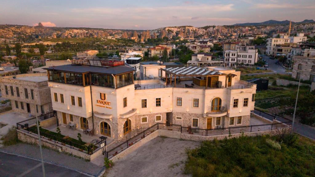 an aerial view of a large white building at Unique Cappadocia Palace in Göreme